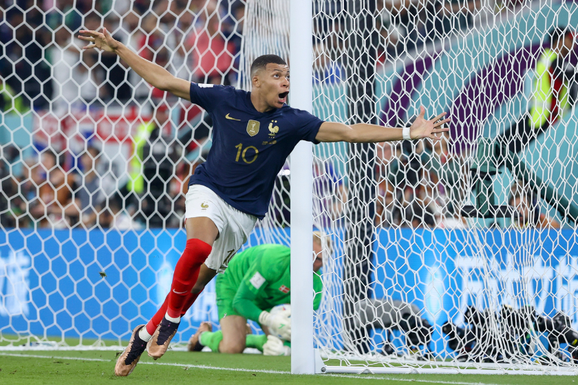 Kylian Mbappe of France celebrates after scoring his team's second goal during the FIFA World Cup Qatar 2022 Group D match between France and Denmark