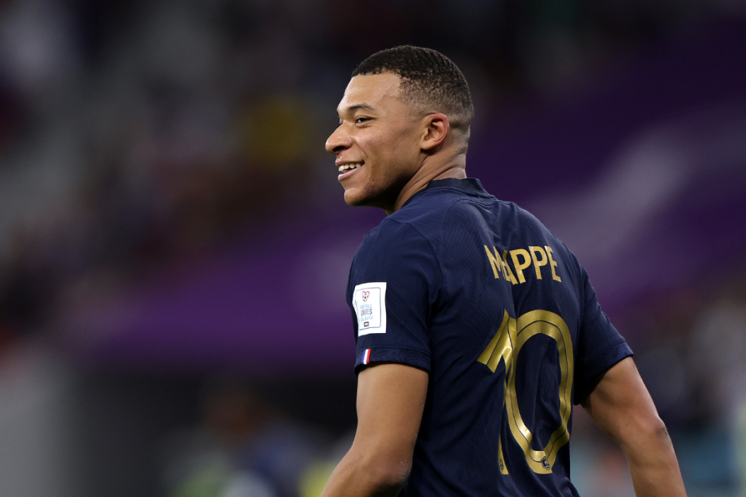 Kylian Mbappe of France celebrates after scoring the team's third goal during the FIFA World Cup Qatar 2022 Round of 16 match between France and Poland.