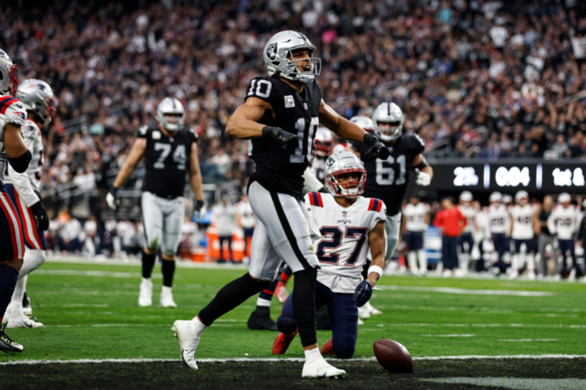 Mack Hollins #10 celebrates after completing a pass for a touchdown during an NFL football game between the Las Vegas Raiders and the New England Patriots