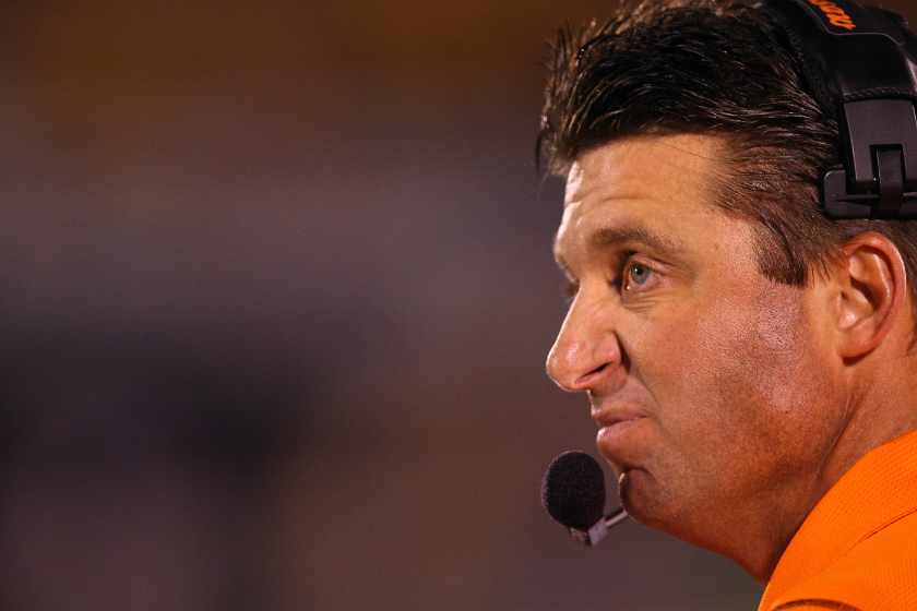 Head coach Mike Gundy of the Oklahoma State Cowboys looks on against the Missouri Tigers for yardage on October 11, 2008 at Memorial Stadium