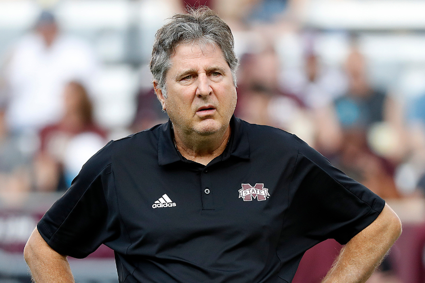 Head coach Mike Leach of the Mississippi State Bulldogs watches his playeres warm up before playing the Texas A&M Aggies at Kyle Field