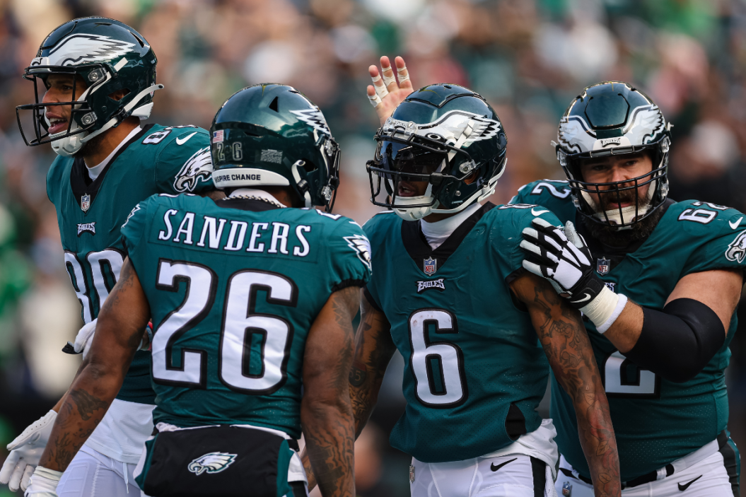 DeVonta Smith #6 of the Philadelphia Eagles celebrates with Tyree Jackson #80, Miles Sanders #26, and Jason Kelce #62 after catching a pass for a touchdown against the Tennessee Titans