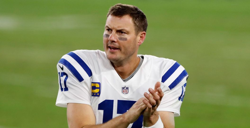 Philip Rivers claps his hands while playing for the Colts.