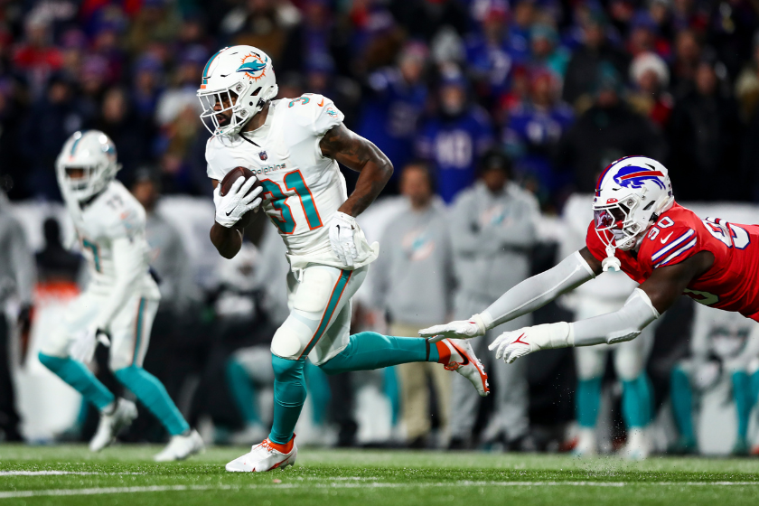 Raheem Mostert #31 of the Miami Dolphins carries the ball during the first quarter of an NFL football game against the Buffalo Bills