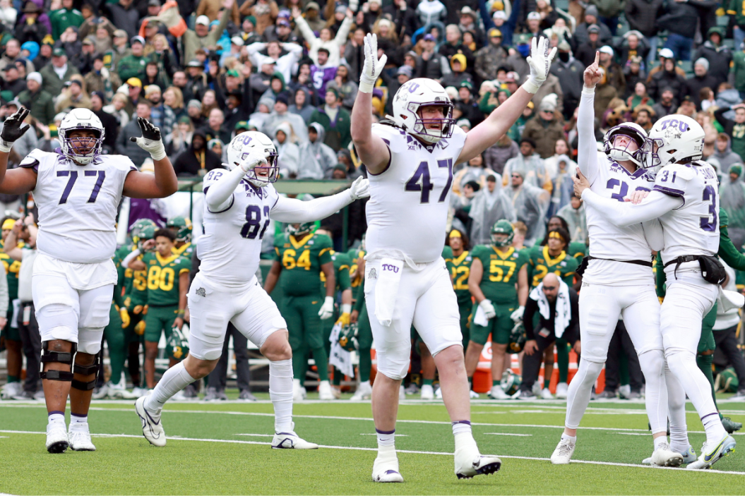 Place kicker Griffin Kell #39 of the TCU Horned Frogs celebrates with punter Jordy Sandy #31, offensive tackle Brandon Coleman #77, tight end Alex Honig #82 and tight end Carter Ware #47 of the TCU Horned Frogs after kicking the game-winning field goal