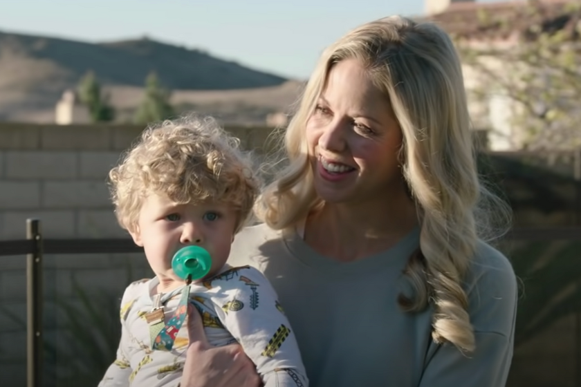 Amy Staley, the wife of Los Angeles Chargers head coach, and one of their three sons. 