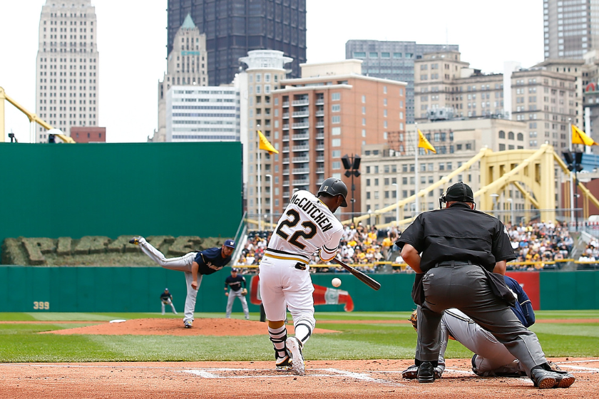 Andrew McCutchen #22 of the Pittsburgh Pirates hits an RBI single in the first inning against the Milwaukee Brewers during the game at PNC Park
