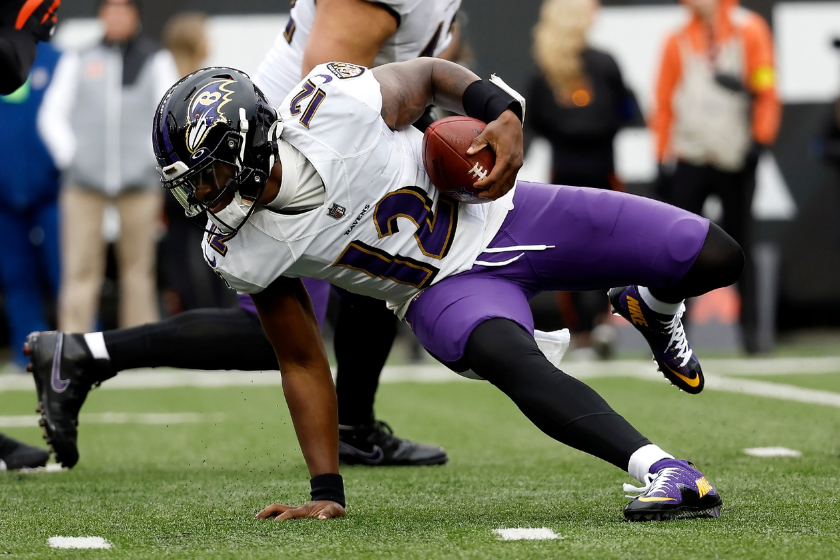 Anthony Brown #12 of the Baltimore Ravens runs with the ball during the game against the Cincinnati Bengals at Paycor Stadium