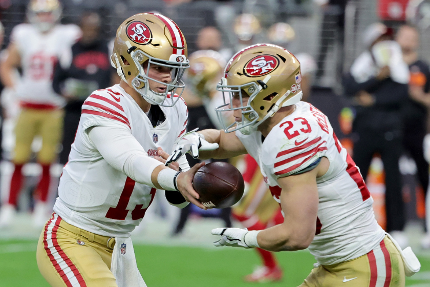 Brock Purdy #13 of the San Francisco 49ers hands off to Christian McCaffrey #23 of the San Francisco 49ers during the first quarter against the Las Vegas Raiders