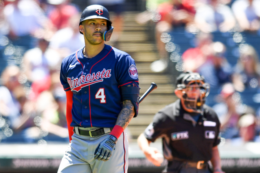 Carlos Correa #4 of the Minnesota Twins reacts to striking out during the fifth inning of game one of a doubleheader against the Cleveland Guardians