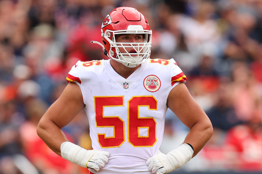 George Karlaftis #56 of the Kansas City Chiefs looks on against the Chicago Bears during the first half of the preseason game at Soldier Field 