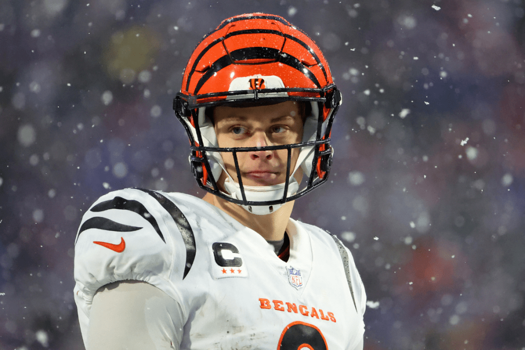 Joe Burrow #9 of the Cincinnati Bengals looks on against the Buffalo Bills during the third quarter in the AFC Divisional Playoff game at Highmark Stadium