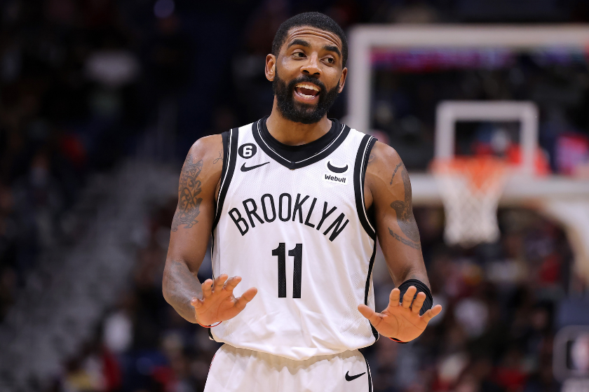 Kyrie Irving #11 of the Brooklyn Nets reacts against the New Orleans Pelicans during a game at the Smoothie King Center 