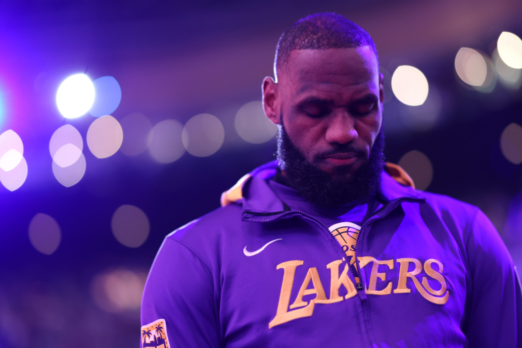 LeBron James #6 of the Los Angeles Lakers stands for the national anthem before the game against the Boston Celtics at TD Garden