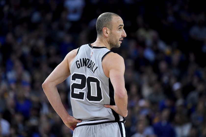  Manu Ginobili #20 of the San Antonio Spurs looks on against the Golden State Warriors during an NBA basketball game at ORACLE Arena