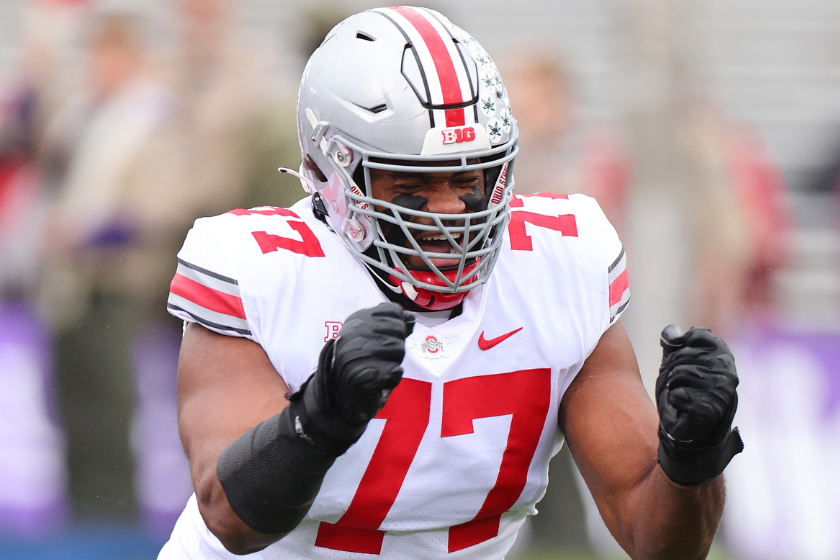 Paris Johnson Jr. #77 of the Ohio State Buckeyes in action against the Northwestern Wildcats during the first half at Ryan Field