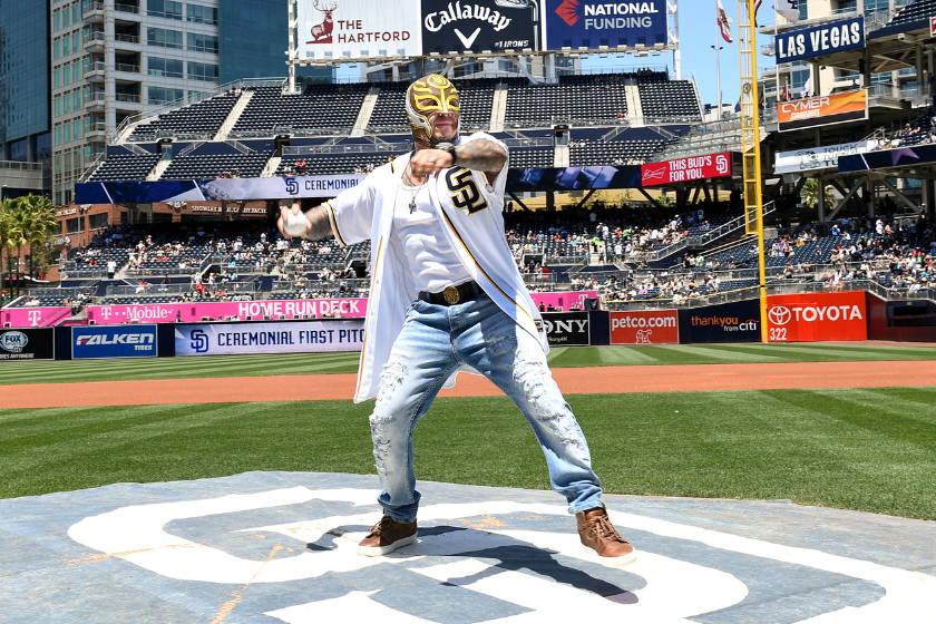 Professional wrestler Rey Mysterio throws a first pitch prior to the game between the San Diego Padres and the Washington Nationals 