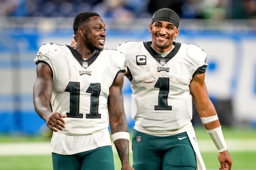 A.J. Brown #11 of the Philadelphia Eagles and Jalen Hurts #1 of the Philadelphia Eagles talk after the game against the Detroit Lions at Ford Field
