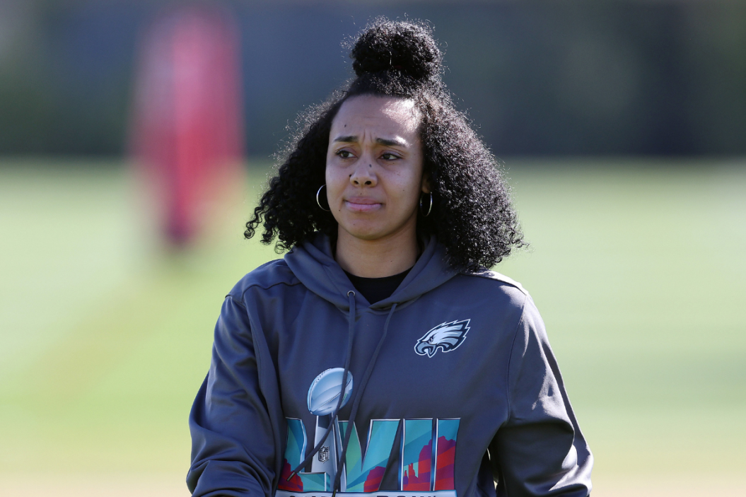 Assistant coach Autumn Lockwood of the Philadelphia Eagles watches practice prior to Super Bowl LVII