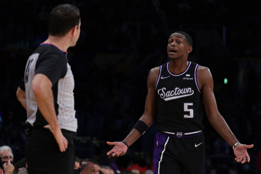 De'Aaron Fox #5 of the Sacramento Kings argues a call with referee Brian Forte #45 during a 122-114 Los Angeles Lakers win at Staples Center