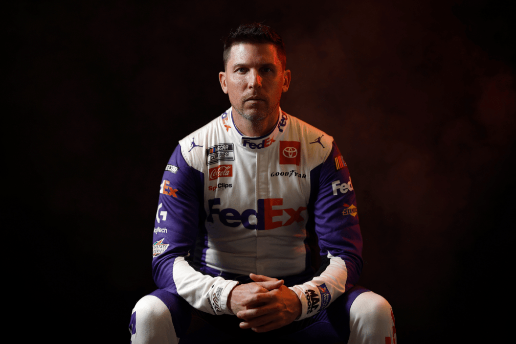 Denny Hamlin poses for a photo during NASCAR Production Days at Charlotte Convention Center on January 18, 2023 in Charlotte, North Carolina