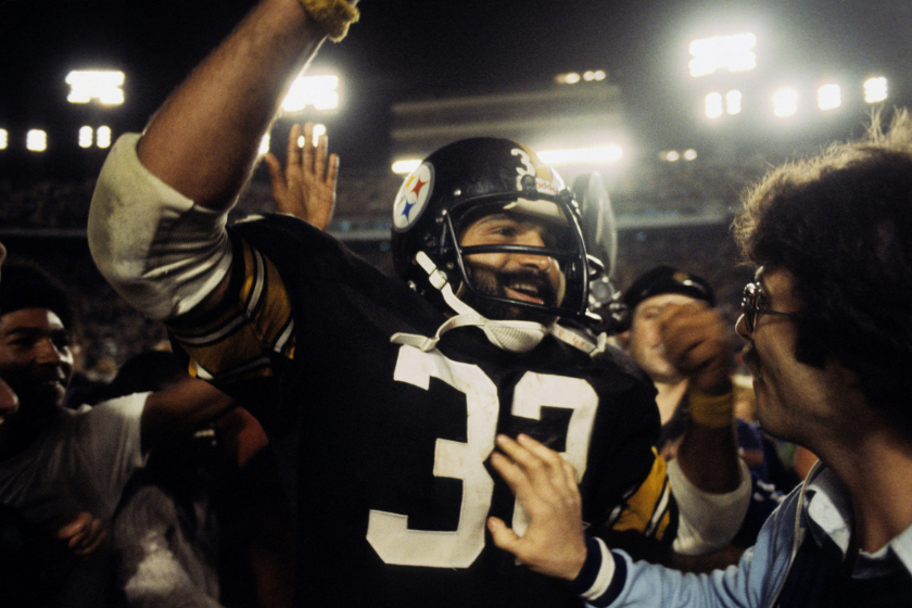 Hall of Fame running back Franco Harris of the Pittsburgh Steelers leaves the field following the Steelers 35-31 victory over the Dallas Cowboys in Super Bowl XIII