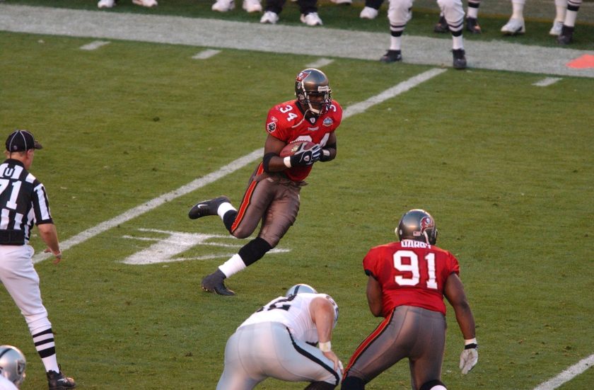 Dexter Jackson intercepts a pass in the Super Bowl.