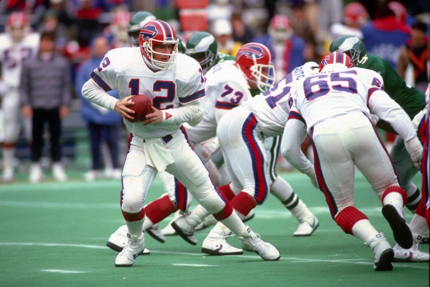 Jim Kelly drops back to pass. 