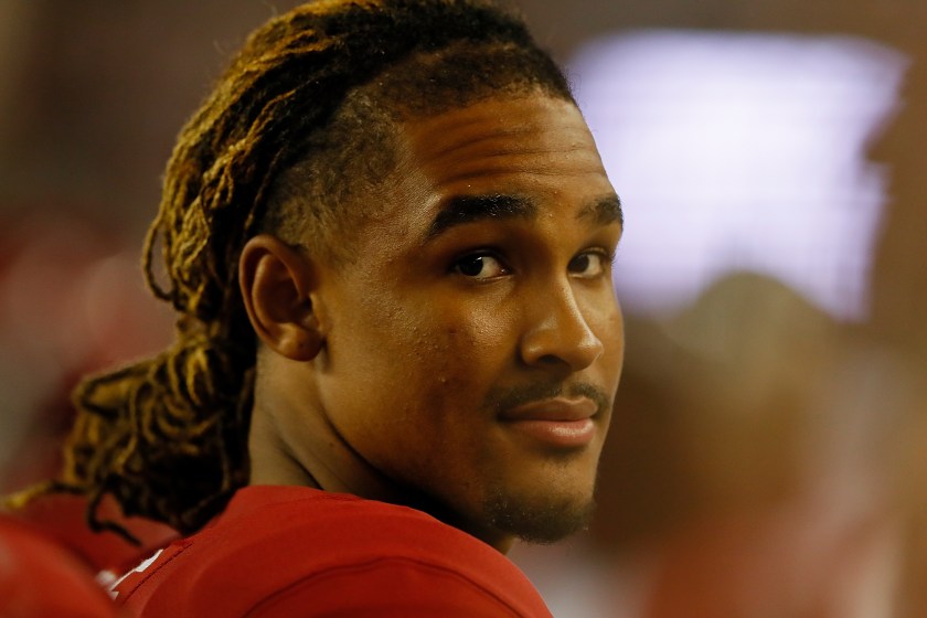 Jalen Hurts looks at the camera while playing for alabama.