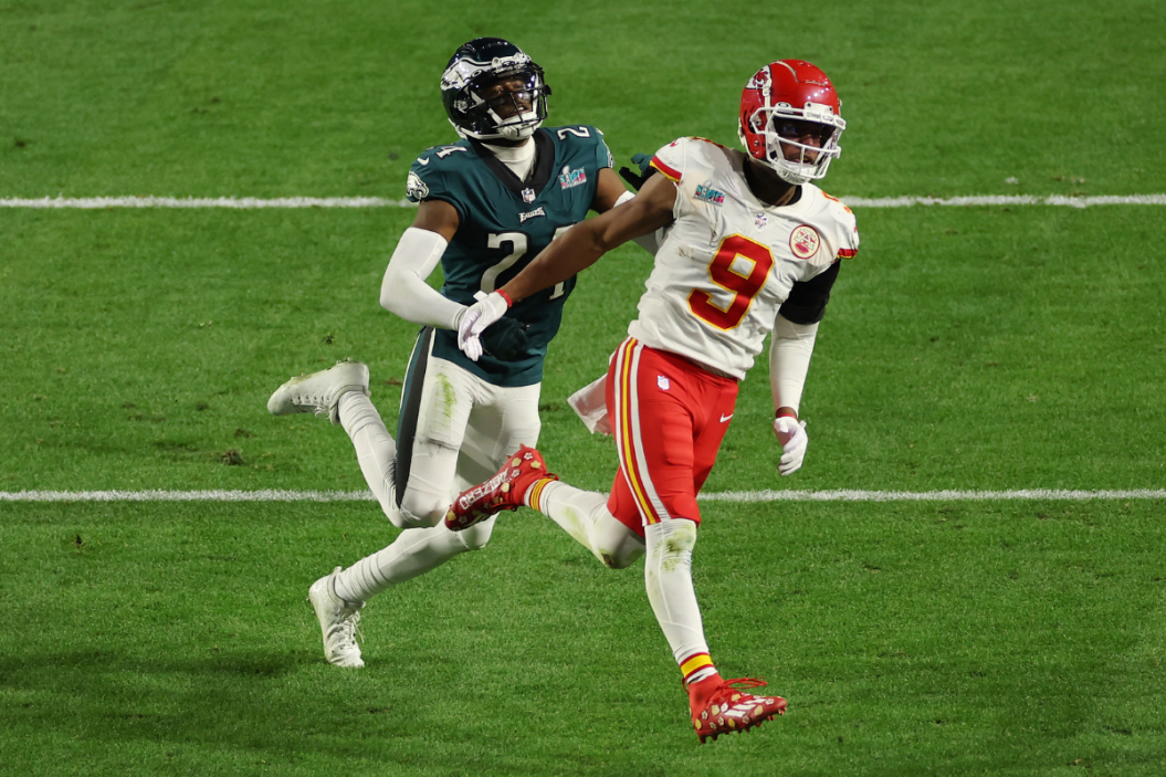 James Bradberry #24 of the Philadelphia Eagles is called for holding against JuJu Smith-Schuster #9 of the Kansas City Chiefs during the fourth quarter in Super Bowl LVII at State Farm Stadium