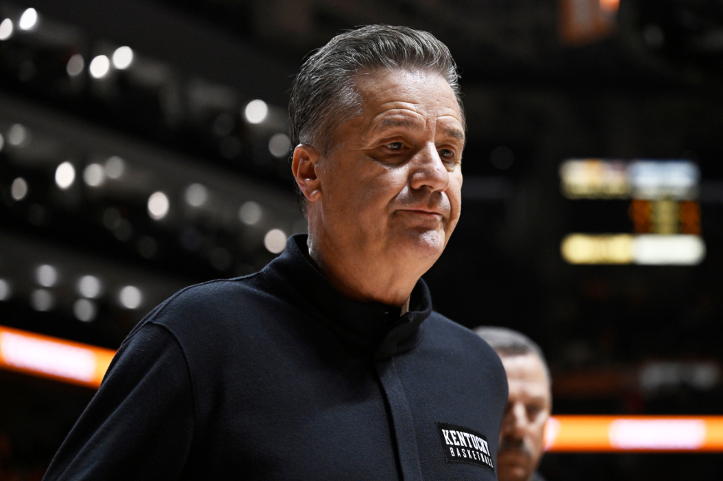 Head coach John Calipari of the Kentucky Wildcats walks off the court after defeating the Tennessee Volunteers at Thompson-Boling Arena