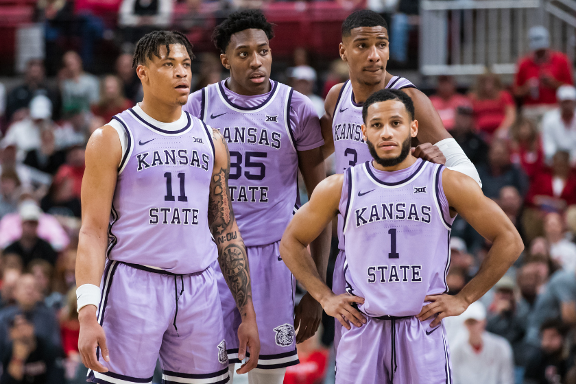 Keyontae Johnson #11, Nae'Qwan Tomlin #35, David N'Guessan #3, and Markquis Nowell #1 of the Kansas State Wildcats stand on the court during the first half of the college basketball game against the Texas Tech Red Raiders at United Supermarkets Arena