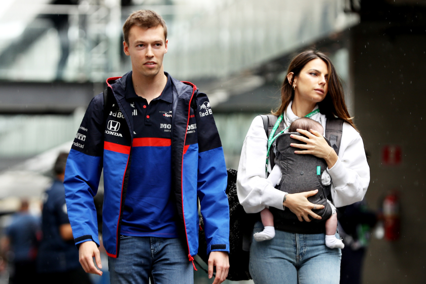  Daniil Kvyat of Russia and Scuderia Toro Rosso and his girlfriend Kelly Piquet walk in the Paddock during previews ahead of the F1 Grand Prix of Brazil at Autodromo Jose Carlos Pace