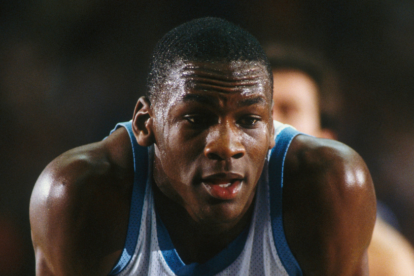 University of North Carolina's Michael Jordan #23 rests for a moment on the court during a game