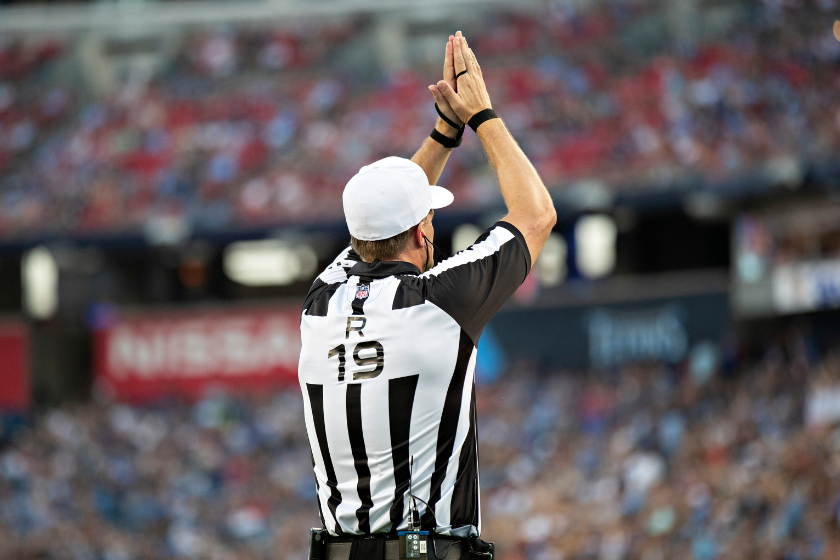 Referee Clay Martin #19 signals a safety during a game against the New England Patriots and the Tennessee Titans during week two of the preseason at Nissan Stadium 