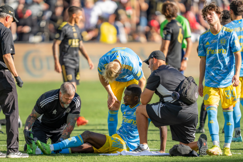Cory Burke #9 of Philadelphia Union is tended to by medical personnel during the MLS Cup Final game between Philadelphia Union and Los Angeles FC at Banc of California Stadium