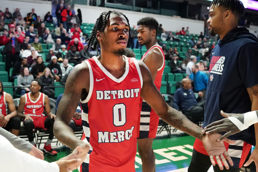 Antoine Davis #0 of the Detroit Mercy Titans is introduced before during a college basketball game against the Eastern Michigan Eagles at the George Gervin GameAbove Center