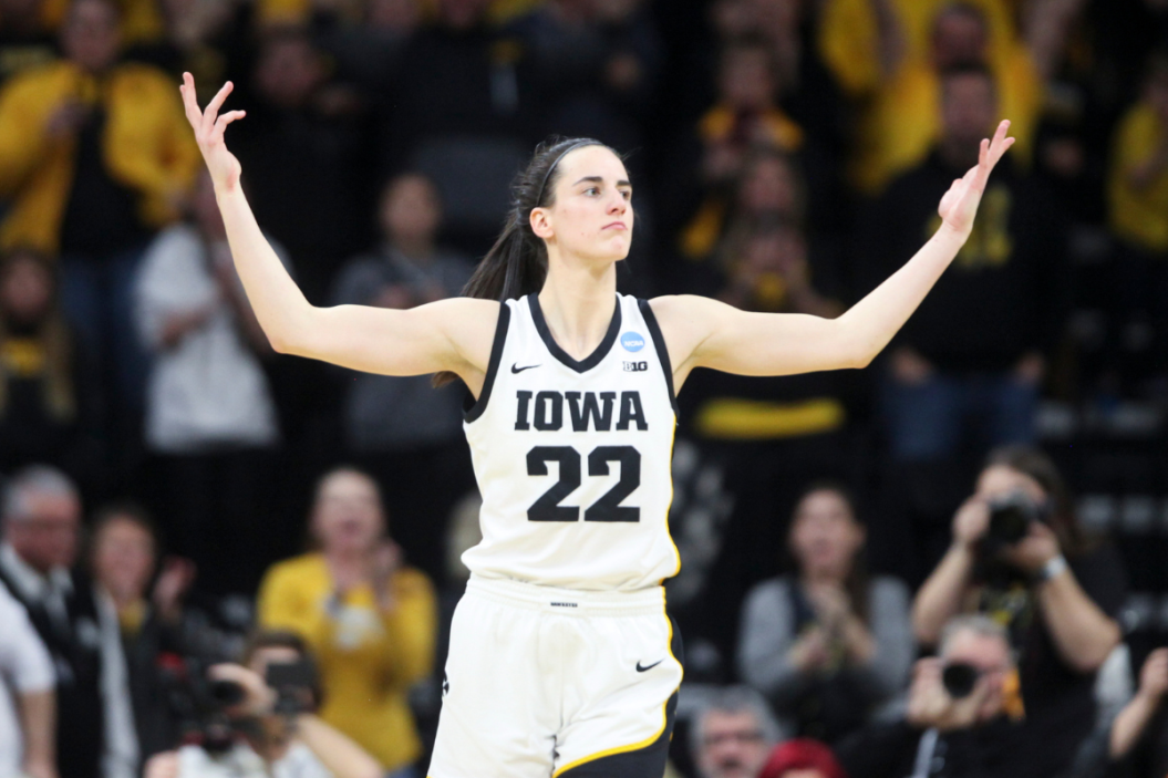 Guard Caitlin Clark #22 of the Iowa Hawkeyes celebrates after a basket against the Georgia Lady Bulldogs late in the second half during the second round of the NCAA Women's Basketball Tournament
