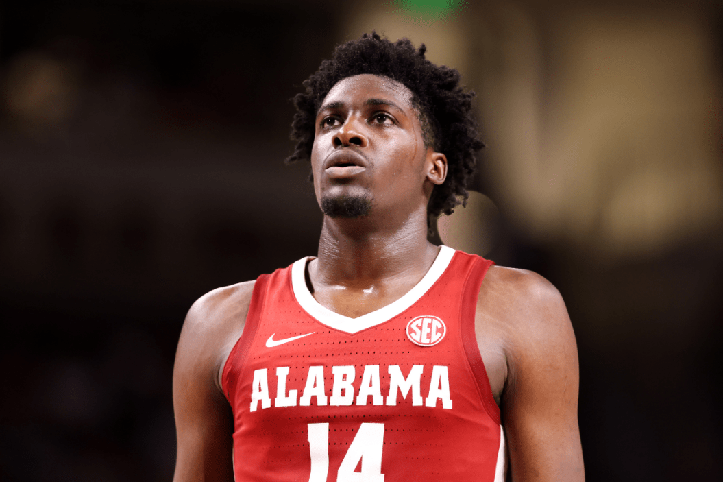 Charles Bediako (14) of the Alabama Crimson Tide prepares to shoot a free throw during a basketball game against the South Carolina Gamecocks