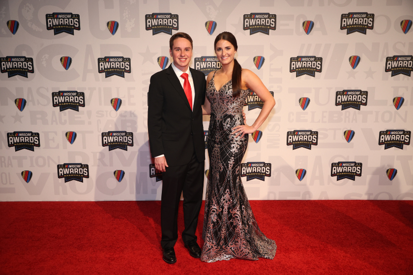 Christopher Bell and wife Morgan pose on the red carpet prior to the 2021 NASCAR Champion's Banquet at the Music City Center in Nashville