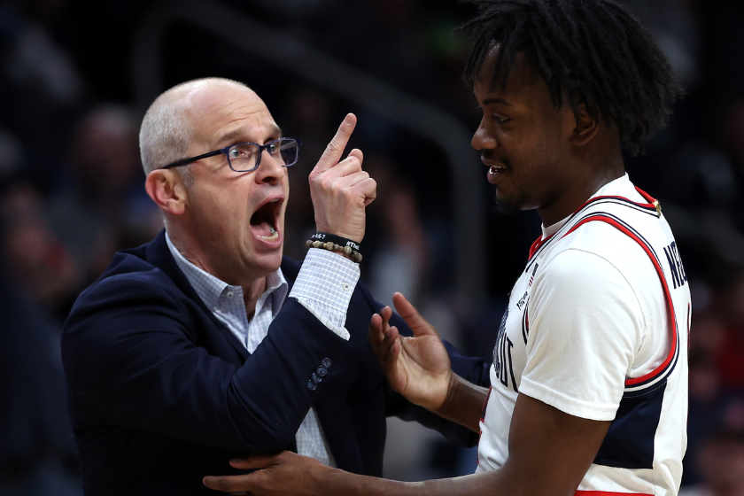 Head coach Dan Hurley of the Connecticut Huskies reacts with Tristen Newton #2 at the end of the first half against the St. Mary's Gaels during the second round of the NCAA Men's Basketball Tournament 