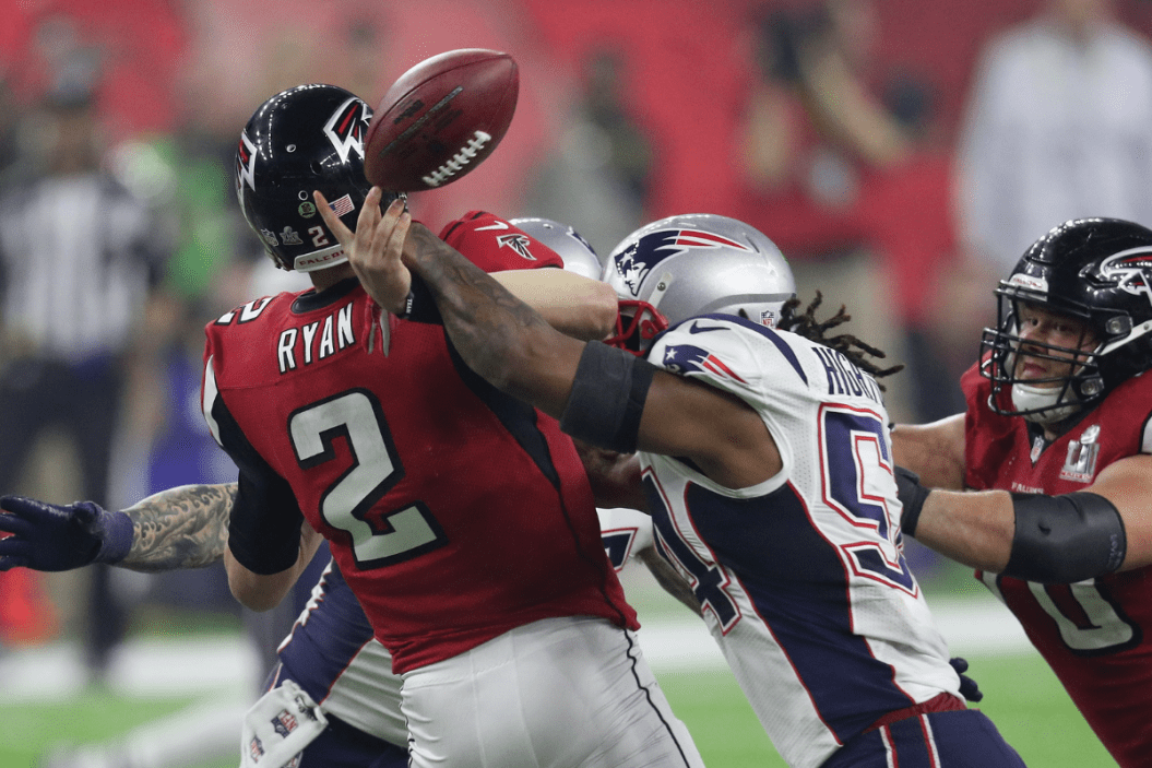 Dont'a Hightower #54 of the New England Patriots forces a fumble from Matt Ryan #2 of the Atlanta Falcons during the fourth quarter during Super Bowl 51 at NRG Stadium