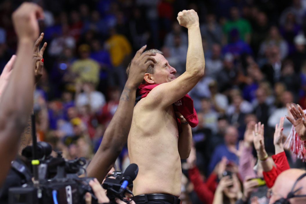 Head coach Eric Musselman of the Arkansas Razorbacks celebrates after defeating the Kansas Jayhawks in the second round of the NCAA Men's Basketball Tournament at Wells Fargo Arena
