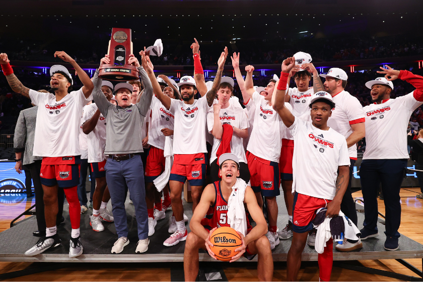The Florida Atlantic Owls celebrate after defeating the Kansas State Wildcats in the game during the Elite Eight round of the 2023 NCAA Men's Basketball Tournament held at Madison Square Garden