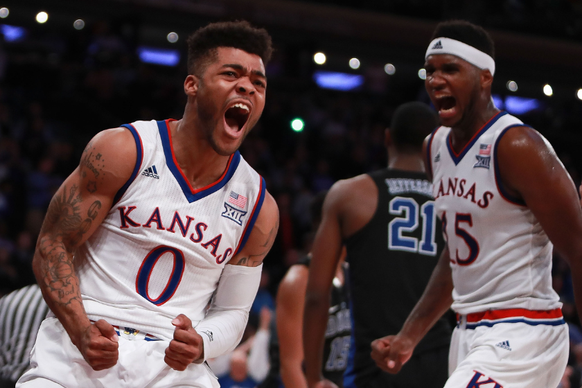 Frank Mason III #0 and Carlton Bragg Jr. #15 of the Kansas Jayhawks react after a foul against the Duke Blue Devils in the second half during the State Farm Champions Classic