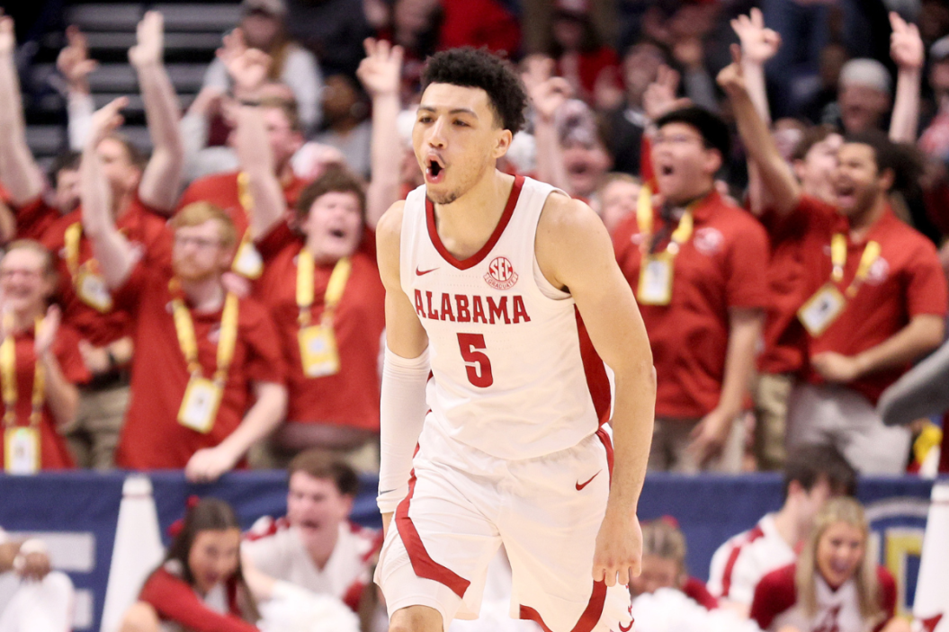 Jahvon Quinerly #5 of the Alabama Crimson Tide celebrates a basket against the Texas A&M Aggies during the second half in the SEC Basketball Tournament Championship game