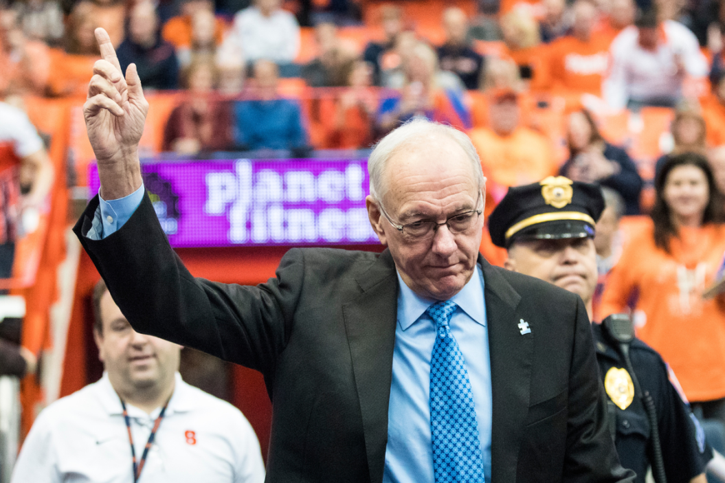 Head coach Jim Boeheim of the Syracuse Orange acknowledges the cheering crowd before the game against the Virginia Cavaliers