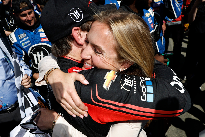 Julia Piquet congratulates fiance Daniel Suarez after he won the 2022 ToyotaSave Mart 350 at Sonoma Raceway