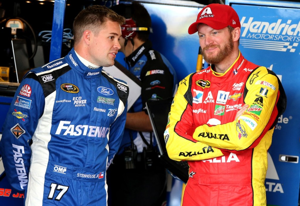 Ricky Stenhouse Jr talks with Dale Earnhardt Jr during practice for the 2016 Good Sam 500 at Phoenix International Raceway