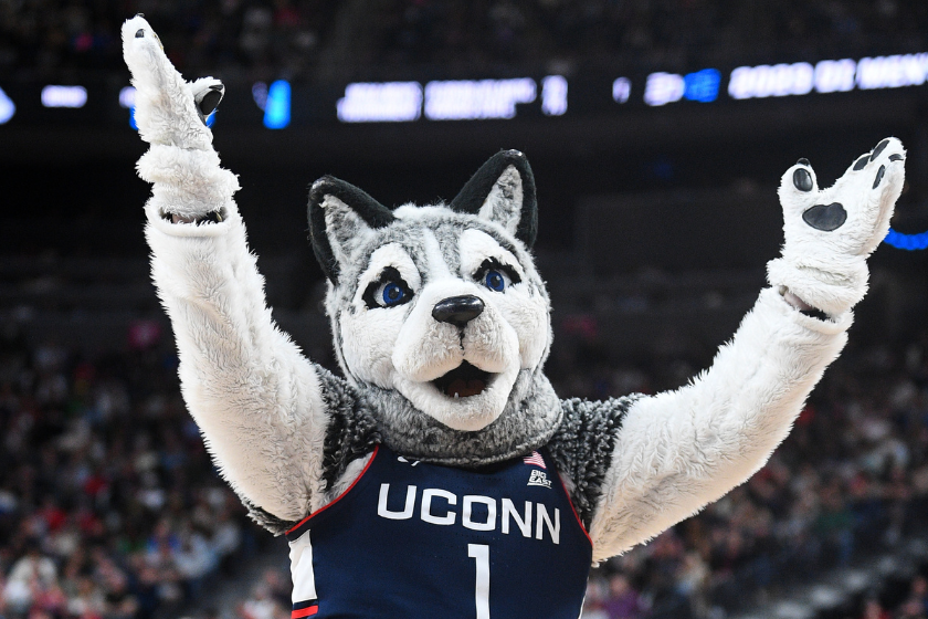 Jonathan the Husky mascot cheers during the NCAA Division I Men's Championship Elite Eight round basketball game between the Gonzaga Bulldogs and the UConn Huskies
